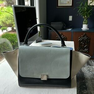 Authentic Celine trapeze leather bag. Black, baby blue and cream color.